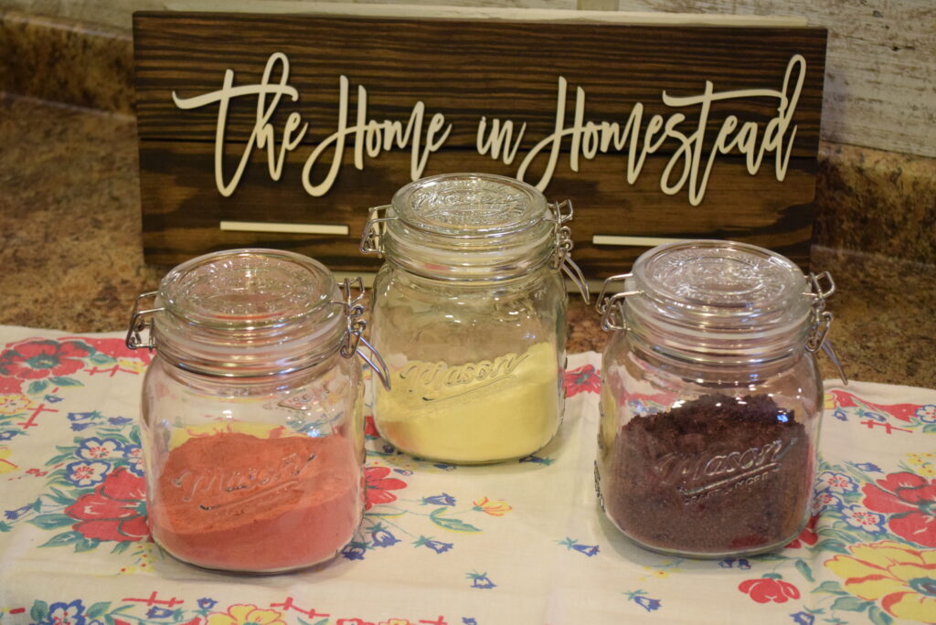 Freeze Dried Fruit Powder in Front of The Home in Homestead Sign